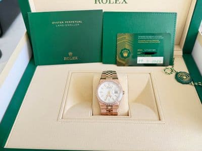 Rolex Rolex Land-Dweller White dial Rose Gold Box and Papers 127285TBR Good Automatic — photo 1